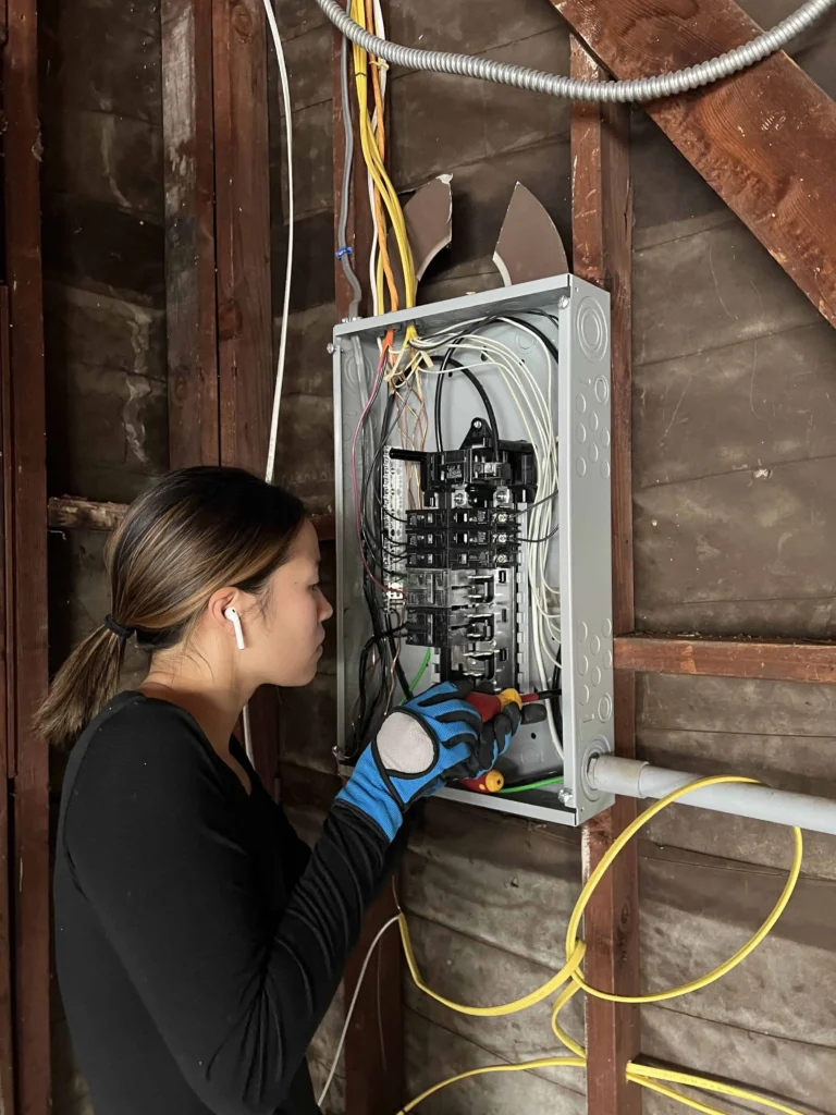 Kris working on electrical panel